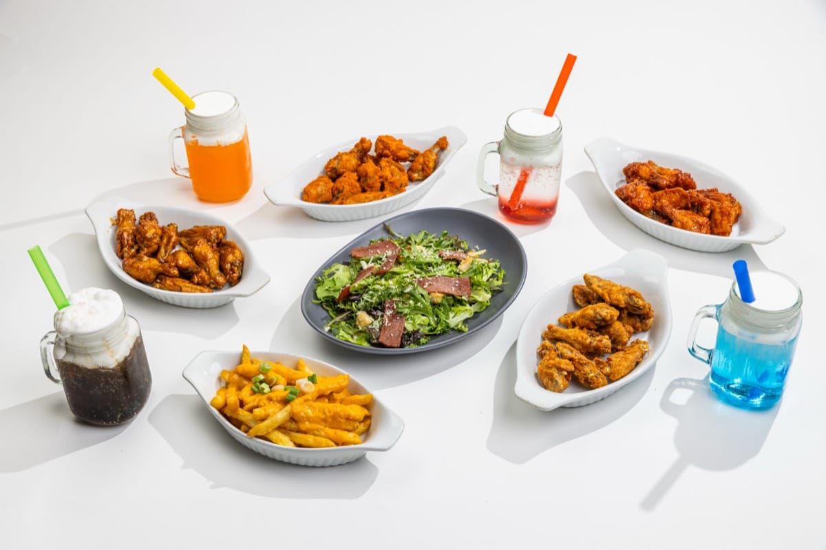 Combo 3: wings, cheesy fries, Caesar salad and dirty sodas